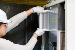 hvac technician completing a new furnace installation